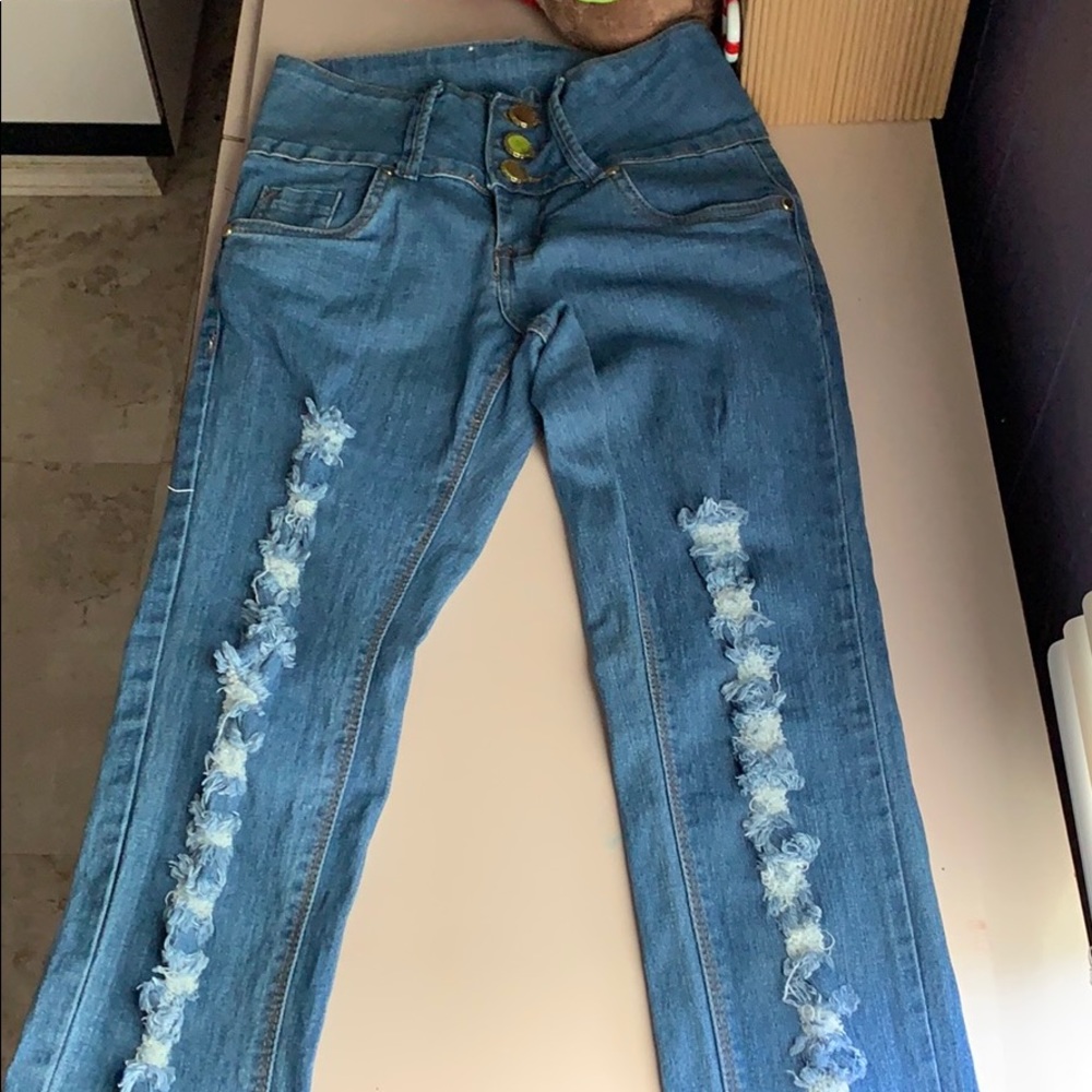 Rip blue jeans